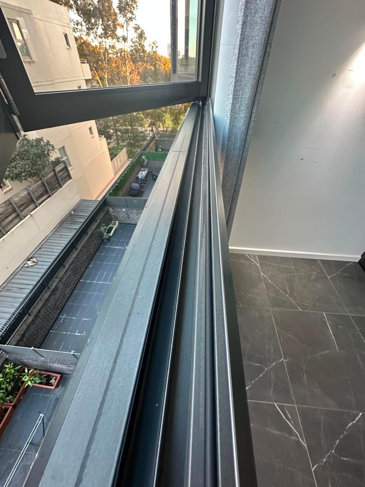 Balcony Window Track — before